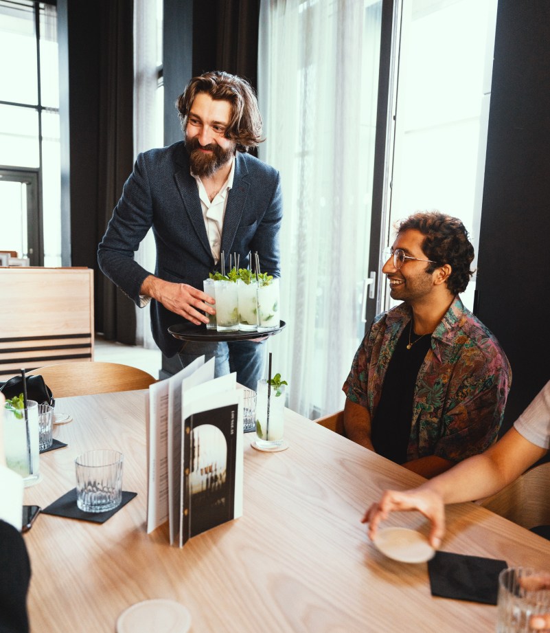Customers being served drinks